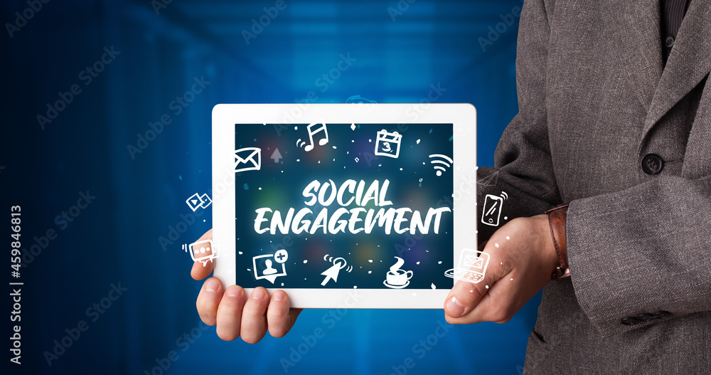 Person holding tablet, social network concept Person holding tablet, social network concept