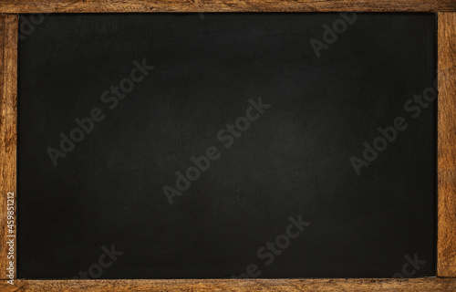 Empty black chalkboard with wooden frame.  Background for school or restaurant design photo