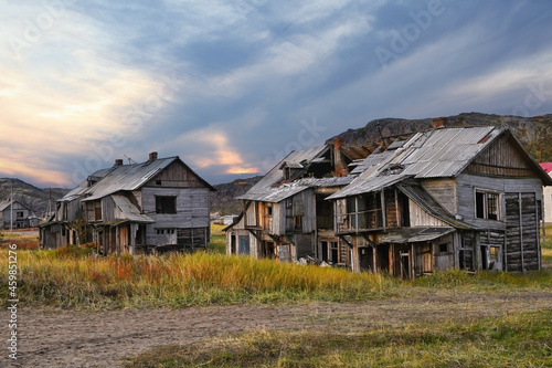 Abandoned wooden houses in the village of Teriberka, , Northern Russia