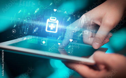 Wallpaper Mural Close-up of a touchscreen with healthcare icons Torontodigital.ca