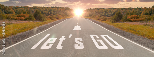 Cuadro en lienzo word let's go written on highway road in the middle of empty asphalt road at beautiful sunset sky