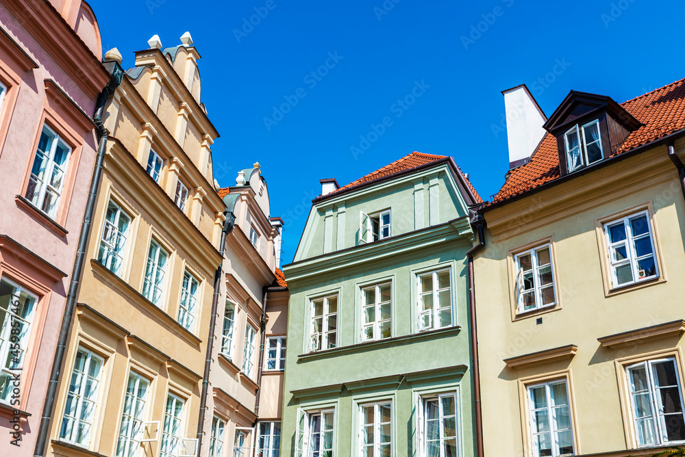 Facade of old classic buildings in Warsaw, Poland