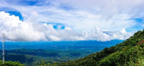 View of high hills and big clouds in the blue sky on Doi Mon Chaem  Chiang Mai  Thailand.
