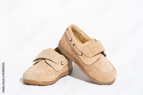 kid shoes in white background for online shop