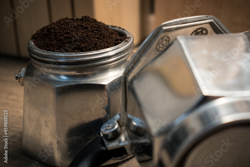 Caffettiera from a side filled with coffee in a kitchen