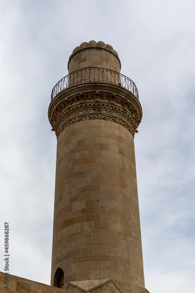 Facade of the Beyler mosque and minaret in the old city of Baku, Azerbeijan (Unesco World Heritage Site)