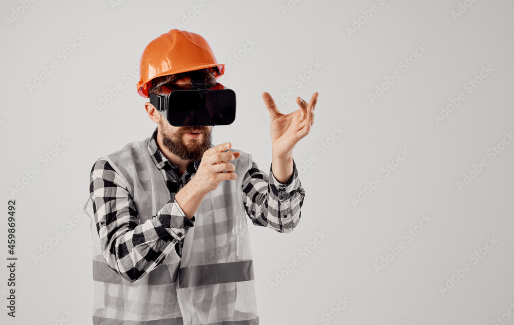 engineer in an orange helmet technology Professional light background