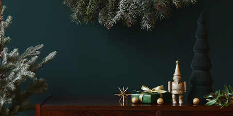 Christmas composition with decoration, christmas tree, gifts and accessories in cozy home decor. Copy space. Template.