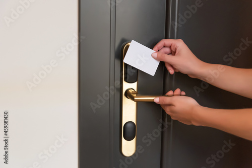 Opening a hotel room door with a magnetic key