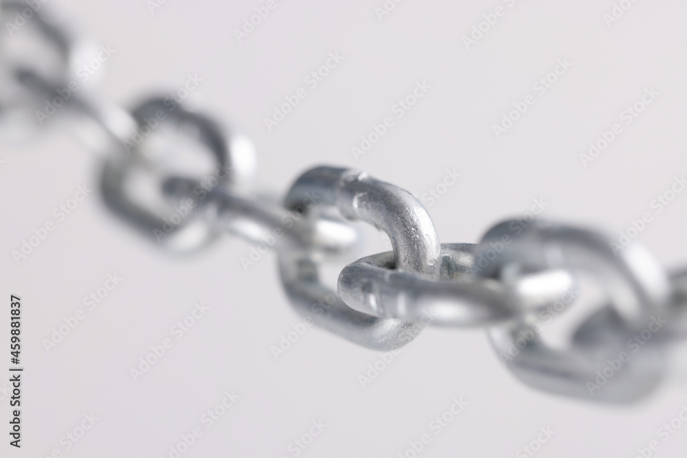 Fototapeta premium Chromed metal chain links in air closeup