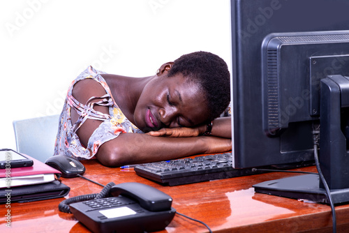 young tired businesswoman sleeping in the office.