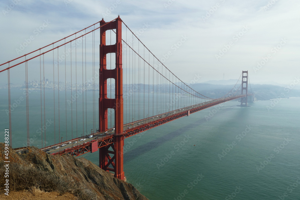 Golden Gate Bridge in mist, famous landmark and popular tourist spot near San Francisco, California, United States