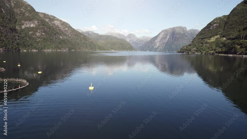 Aerial view of a salmon farm in the fjord of Norway Aerial view of a salmon farm in the fjord of Norway