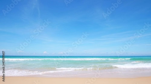 Phuket beach Thailand. Beautiful tropical beach with blue sky and clouds. Tropical beach with waves crashing empty beach. Andaman  Sea sand and sky on beautiful summer day holiday