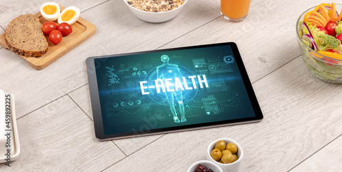 Tablet Pc with fruits, medical concept