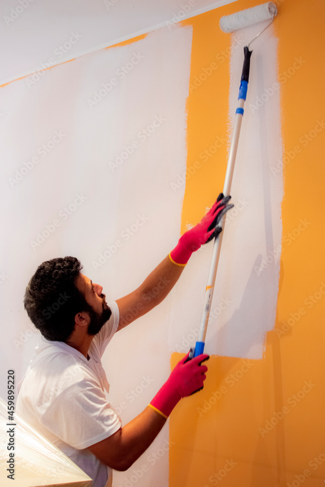 Painters refurbishing a small apartment. Painters refurbishing a small apartment.
