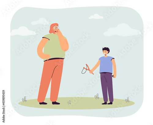 Woman worried about naughty boy with slingshot. Mischievous kid character playing with slingshot flat vector illustration. Bad behavior of child concept for banner, website design or landing web page