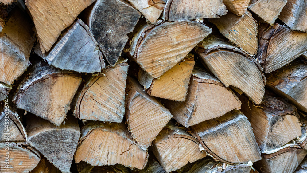 Fototapeta premium stack of firewood closeup background full frame