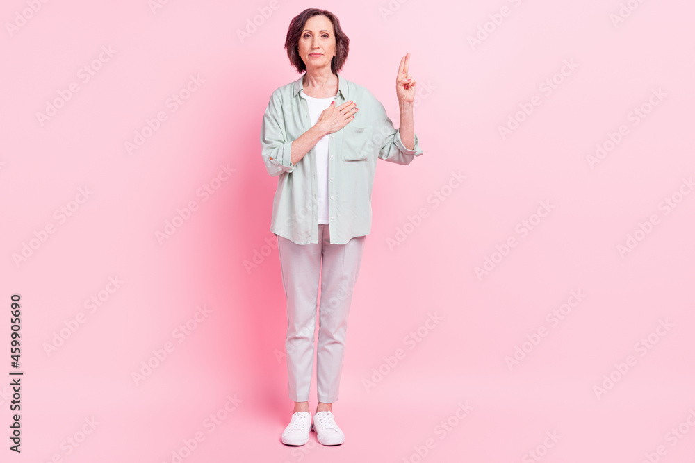 Full size photo of serious concentrated people hand on chest raise fingers isolated on pink color background Full size photo of serious concentrated people hand on chest raise fingers isolated on pink color background