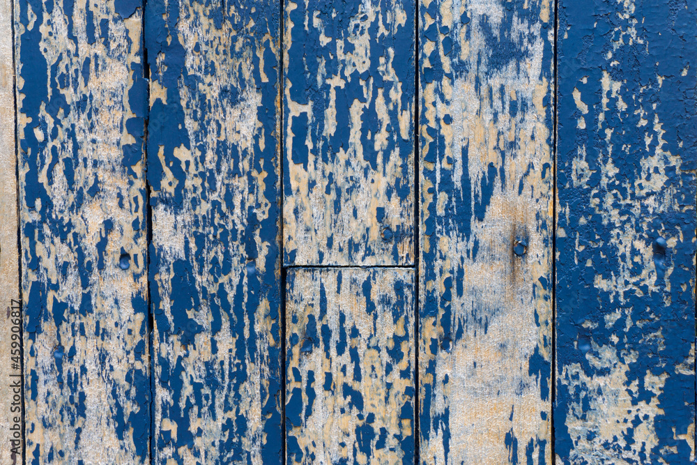 Fototapeta premium Colourful distressed wooden texture background painted blue