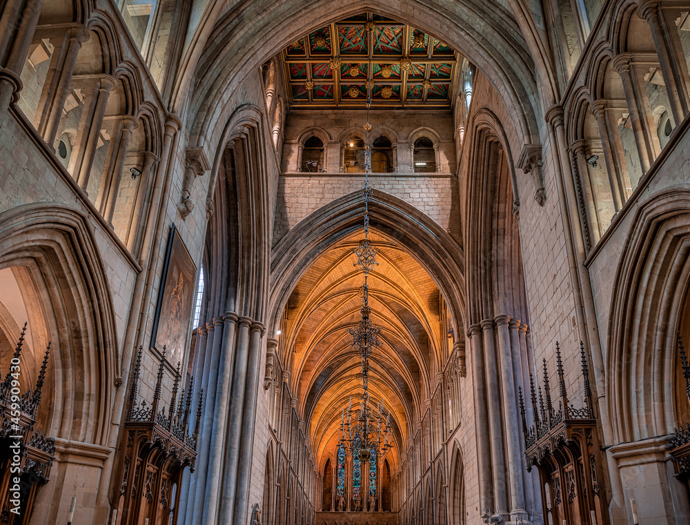 The nave and the ornate columms of the neogothic style Southwark Cathedral in London, UK
