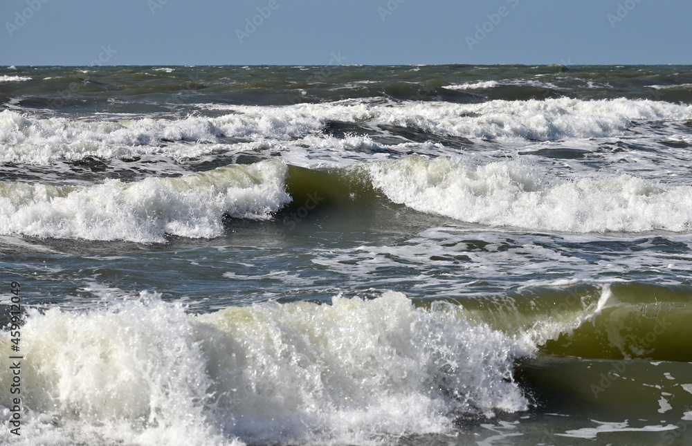 Waves running with foam in the Baltic Sea Waves running with foam in the Baltic Sea