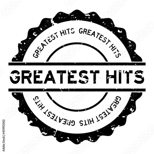 Grunge black greatest hits word round rubber seal stamp on white background