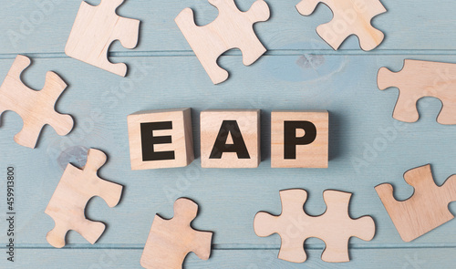 Blank puzzles and wooden cubes with the text EAP Employee Assistance Program