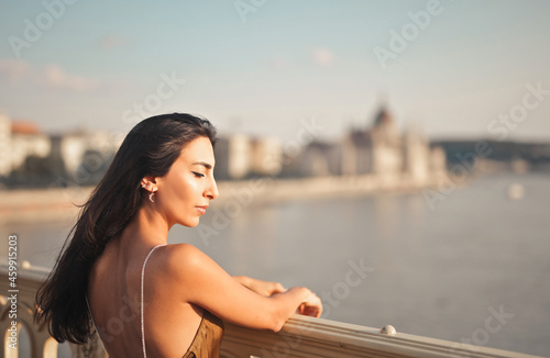 young woman on a bridge in budapest photo