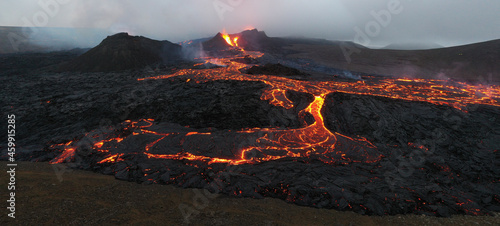volcano erupting from aerial point of view in panoramic
