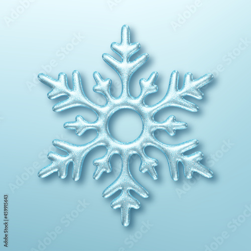 Three dimensional shiny snowflake on blue background. Design element for Christmas greeting card