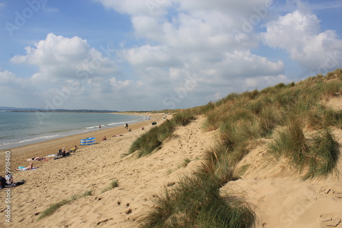 фотографія Camber sands East Sussex UK - view of Camber Sand dunes with sky and sea dunes h