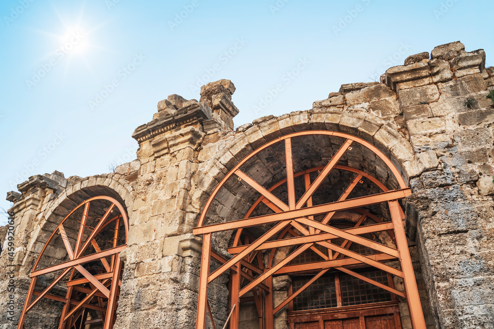 Arch of the amphitheater of the ancient city, reinforced with metal beams.