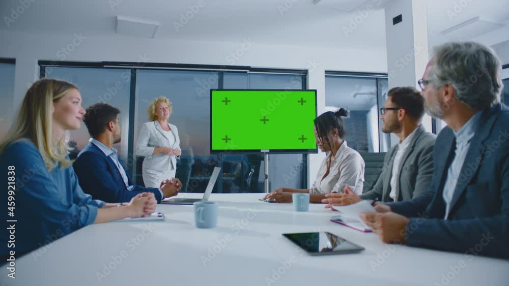 Answering questions after business presentation. Offering services to company management. Modern open space office interior. Answering questions after business presentation. Offering services to company management. Modern open space office interior.