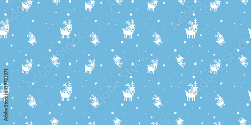Deer, seamless pattern on a blue background. Pixel perfect Christmas pattern.