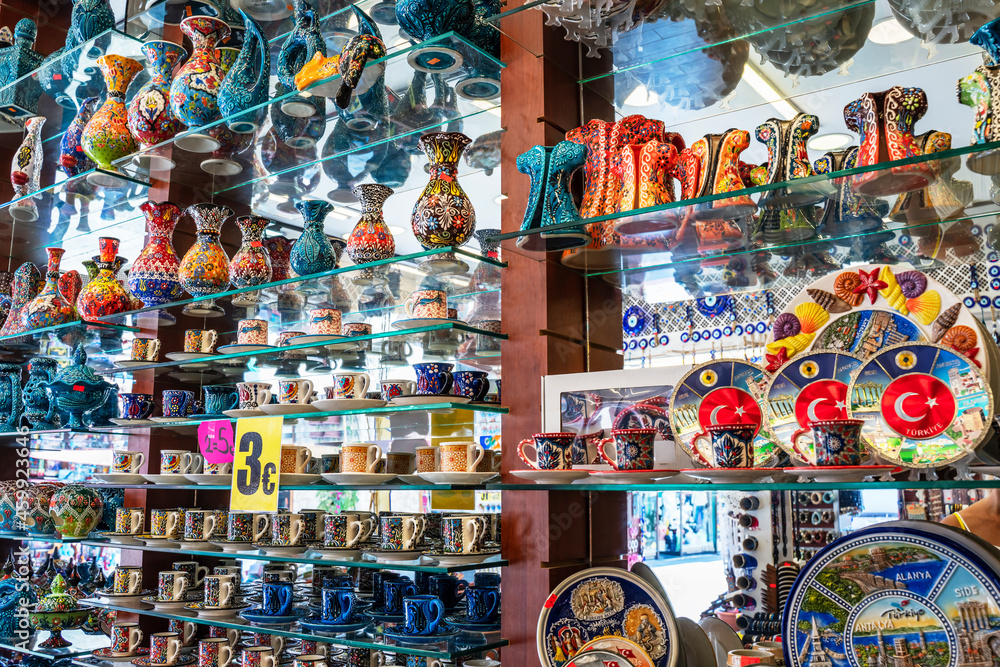 Fototapeta premium Souvenirs at the Grand Bazar market, Turkey. Traditional Turkish handmade souvenirs at the gift shop, soft selective focus