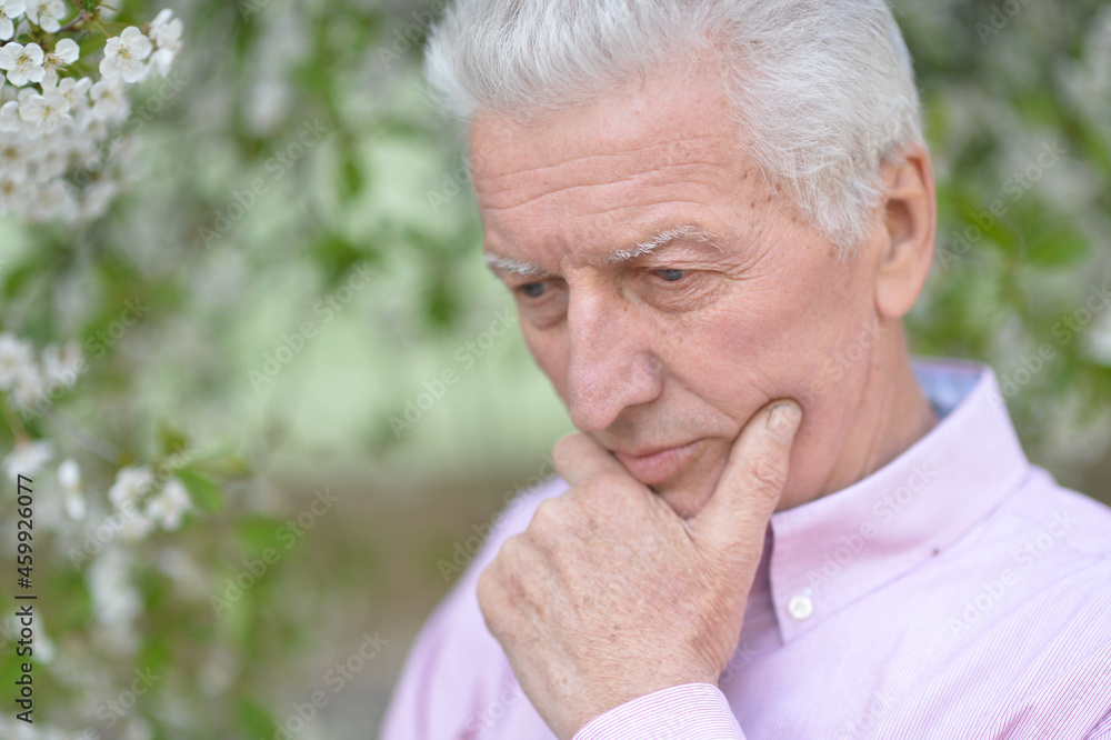 Senior man thinking about something outdoor Senior man thinking about something outdoor