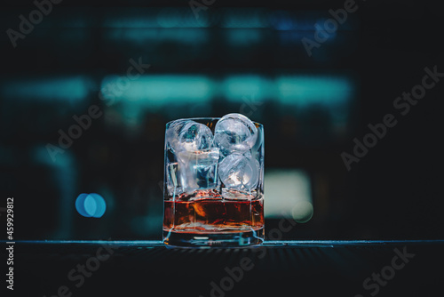 Photography bartender making Cuba Libre cocktail in bar