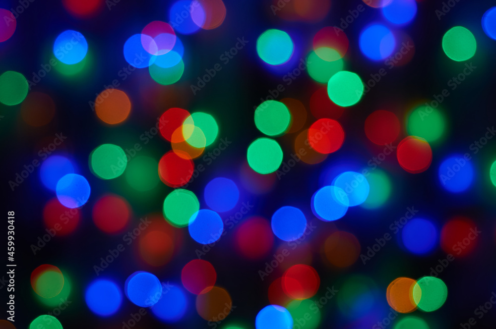 Blurred photo bokeh bright christmas lights .