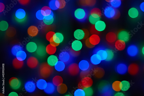 Blurred photo bokeh bright christmas lights .