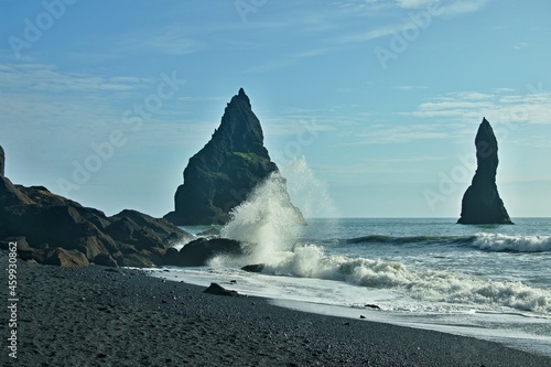 Iceland-view of the black sand beach and sea mounts at Reynisdrangar, near Vik