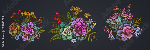 Flower bouquet of colored wax flower, forget me not flower, tansy, ardisia, brassica, decorative cabbage