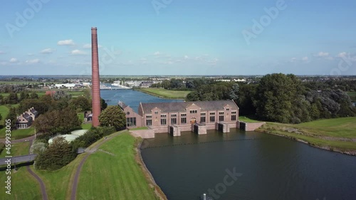 The Woudagemaal is the largest steam pumping station ever built in the world. Located in Lemmer in the Netherlands, aerial backwards photo