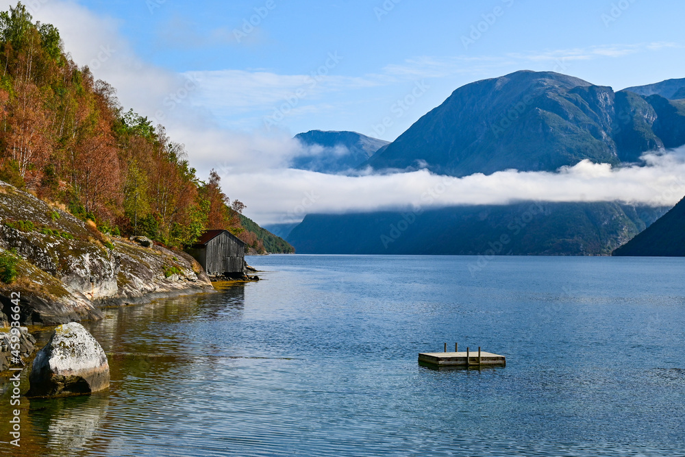 Amazing views of a typical norwegian Fjord. Geiranger Fjord in Hellesylt in autumn