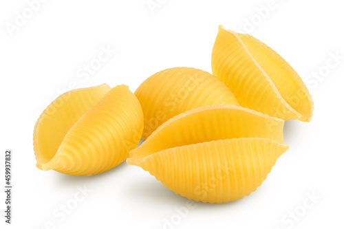 Uncooked dried conchiglie. Raw organic shell pasta isolated on white bachground with clipping path and full depth of field