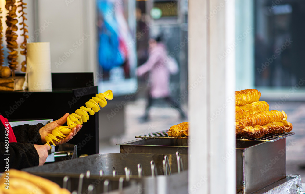 View of spiral or twisted potato chips in a street food vendor stall
