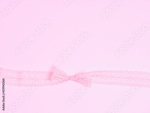 Top view of Christmas composition on pastel pink background. Holiday greeting card with copy space to text.