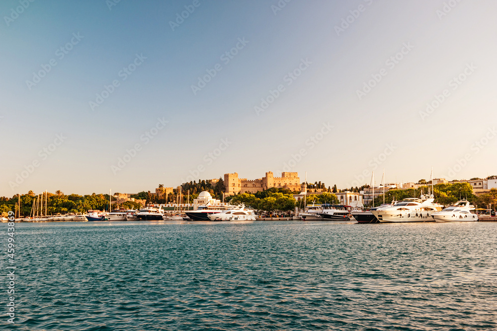 Old City of Rhodes Island at sunset. View from the sea