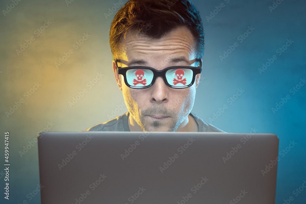 Man with computer problems in front of a laptop Man with computer problems in front of a laptop