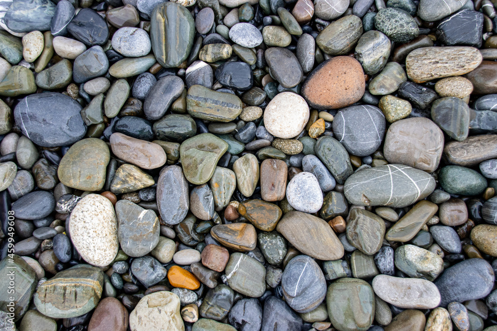Abstract pebble background. Pebble texture on the Black Sea beach Abstract pebble background. Pebble texture on the Black Sea beach
